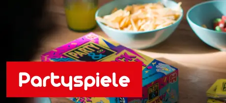 Partyspiel Party & Co. – Shock You liegt auf einem Tisch