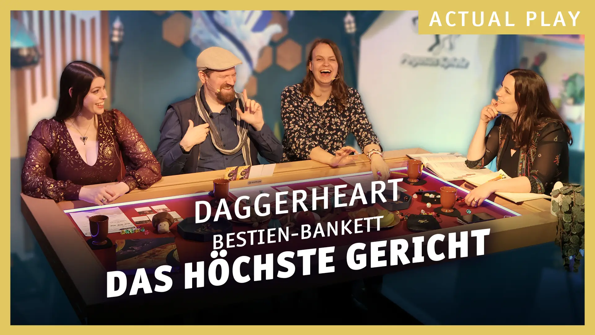 Daggerheart Bestien-Bankett Das höchste Gericht Actual Play; Vier Personen sitzen an einem Spieltisch mit Würfeln und Rollenspiel Materialien