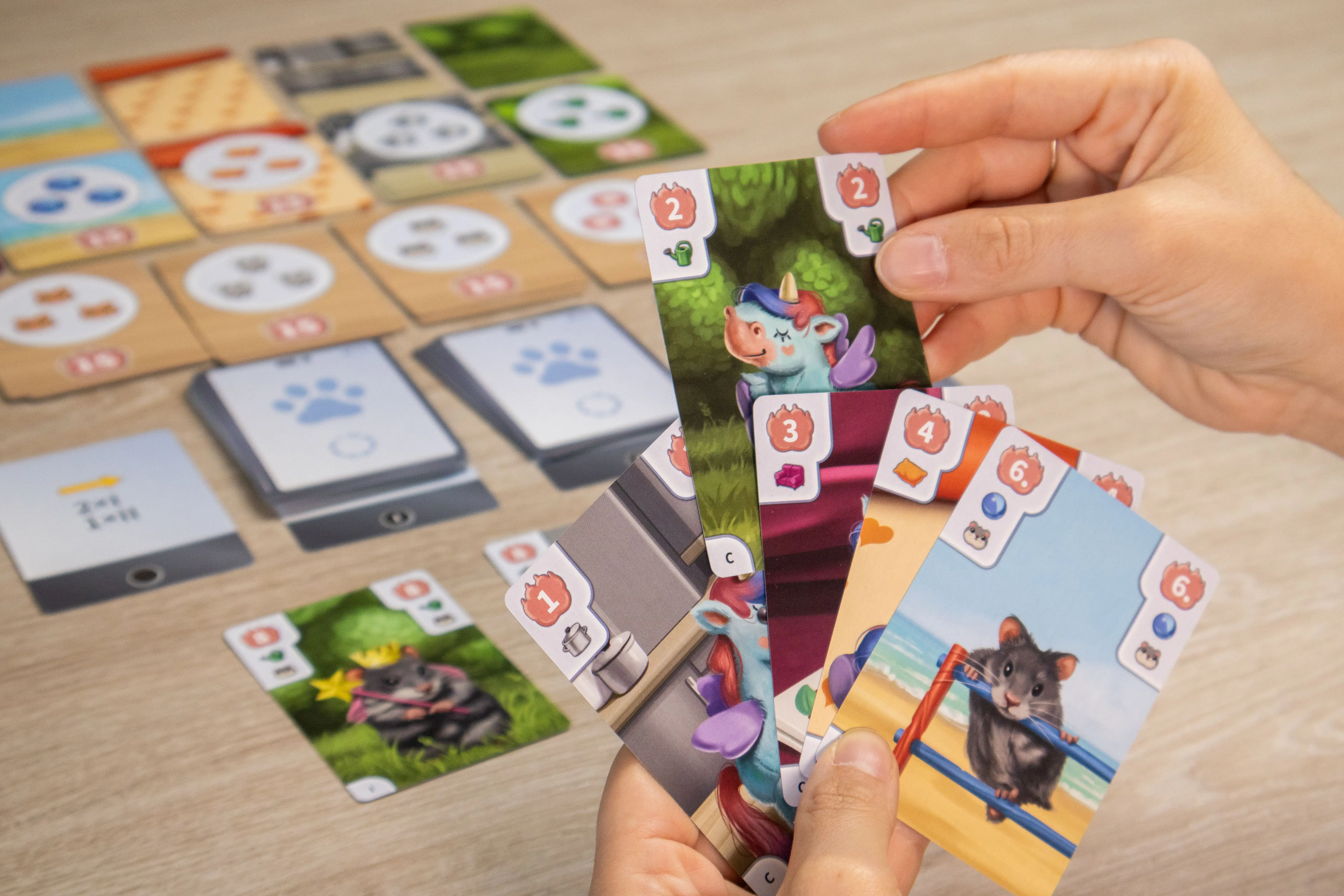Cards with pets and numbers of the card game Paws Up